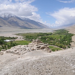 a Buddhist stupa with Afghanistan in the background