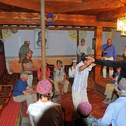 Dancing in a traditional Tajik house